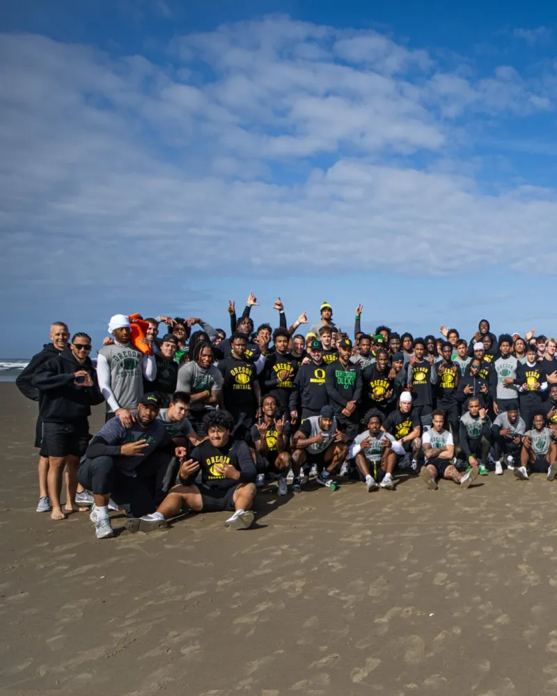 Oregon Football team photo on the Oregon coast